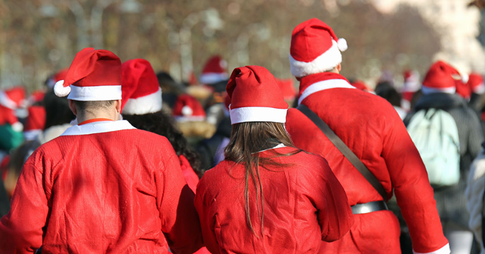 people wearing santa hats